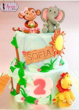 Tarta animales niña con mono y elefante en la cima, nombre SOFIA, número 2 rosa y león en la base en Auxai Tartas