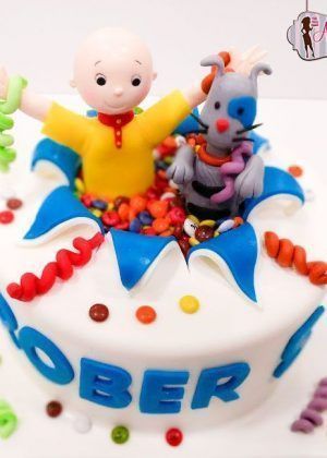 Tarta Caillou Infantil con figuras de Caillou y Gilbert, caramelos y nombre Rober