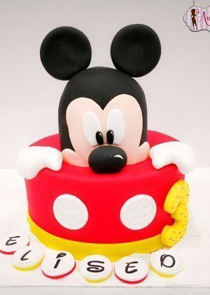 Tarta Disney media cara de Mickey Mouse con media cara grande, número 3 y nombre Eliseo