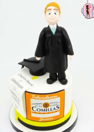 Tarta de graduación chico con diseño infantil: fondant amarillo brillante, muñeco de graduación manual en traje negro elegante