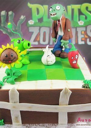 Tarta Zombies vs Plants con figuras 3D de Sunflower, Peashooter y Zombie en tablero en Auxaitartas