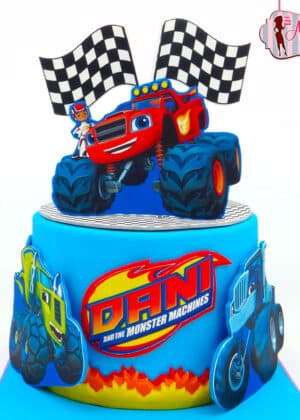 tarta Monster Machine papel de azúcar personalizada, monster truck gigante rojo, pista de carreras emocionante, ruedas enormes con llamas ardientes, decoración espectacular cumpleaños infantil, Madrid