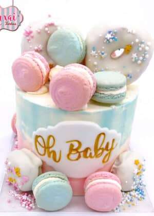 Tarta Gender Reveal macarons con macarons pastel y placa Oh Baby en Auxaitartas