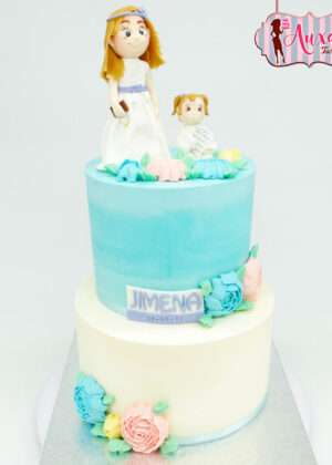 Tarta comunión flores buttercream con figuras de niña y ángel en Auxaitartas