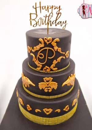 Tarta de cumpleaños dorado y negro