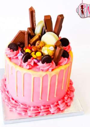 Tarta drip cake rosa con chuches