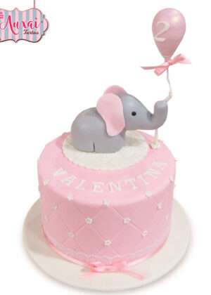 Tarta animales elefante 2 años con acabado capitoné rosa y globo modelado de Auxai Tartas en Madrid