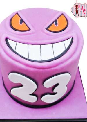 Tarta pokemon lugia madrid decorada con olas azules y figura de fondant del pokémon legendario.